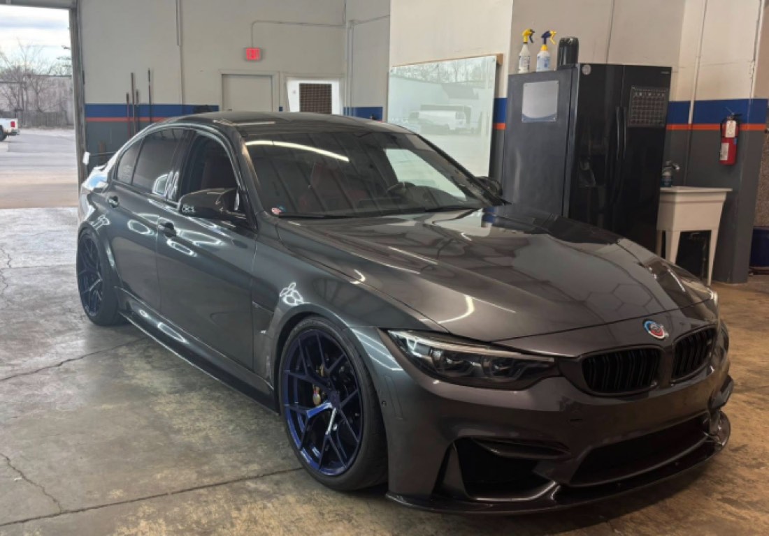 BMW M3 tinted and detailed in the Top Tier Tint bay